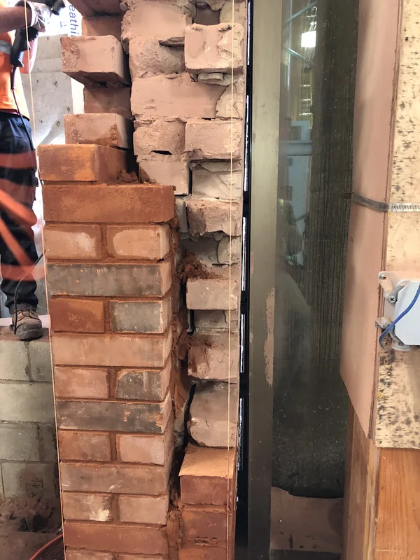 Brick pier rebuilt and toothed into the old brickwork in Toronto